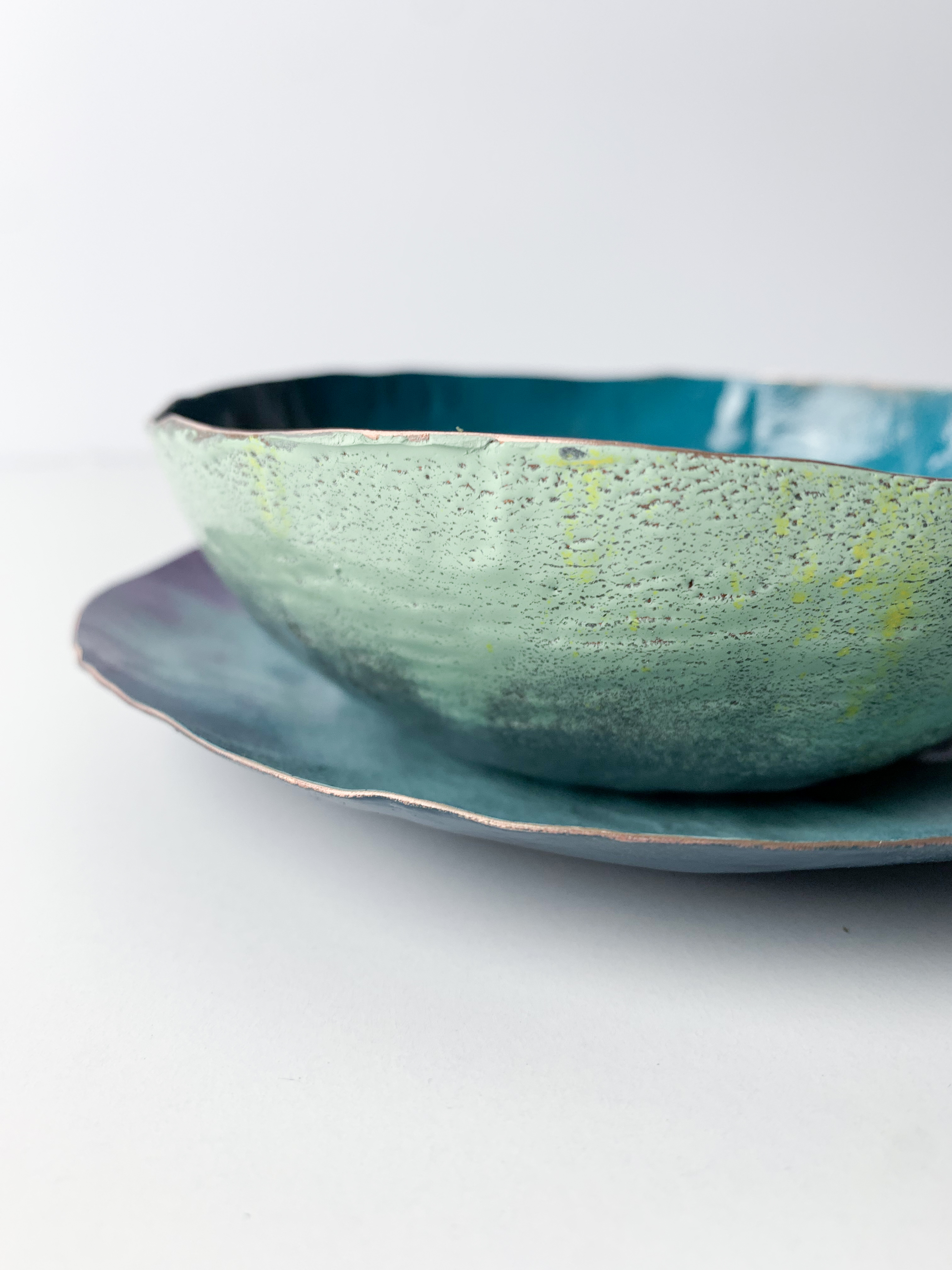 handmade decorative bowl, powder coated with organic raw copper edge