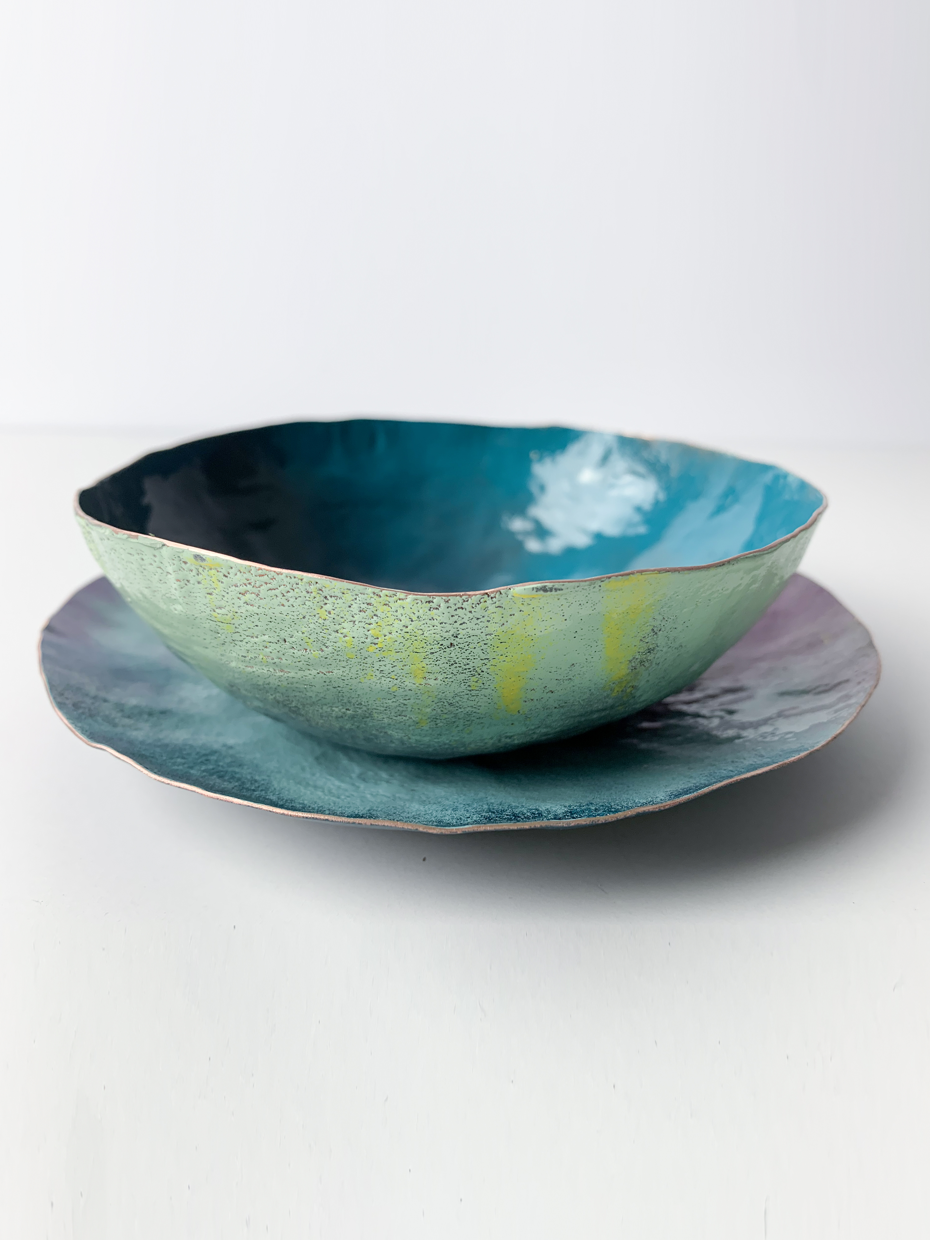 handmade decorative bowl, powder coated with organic raw copper edge