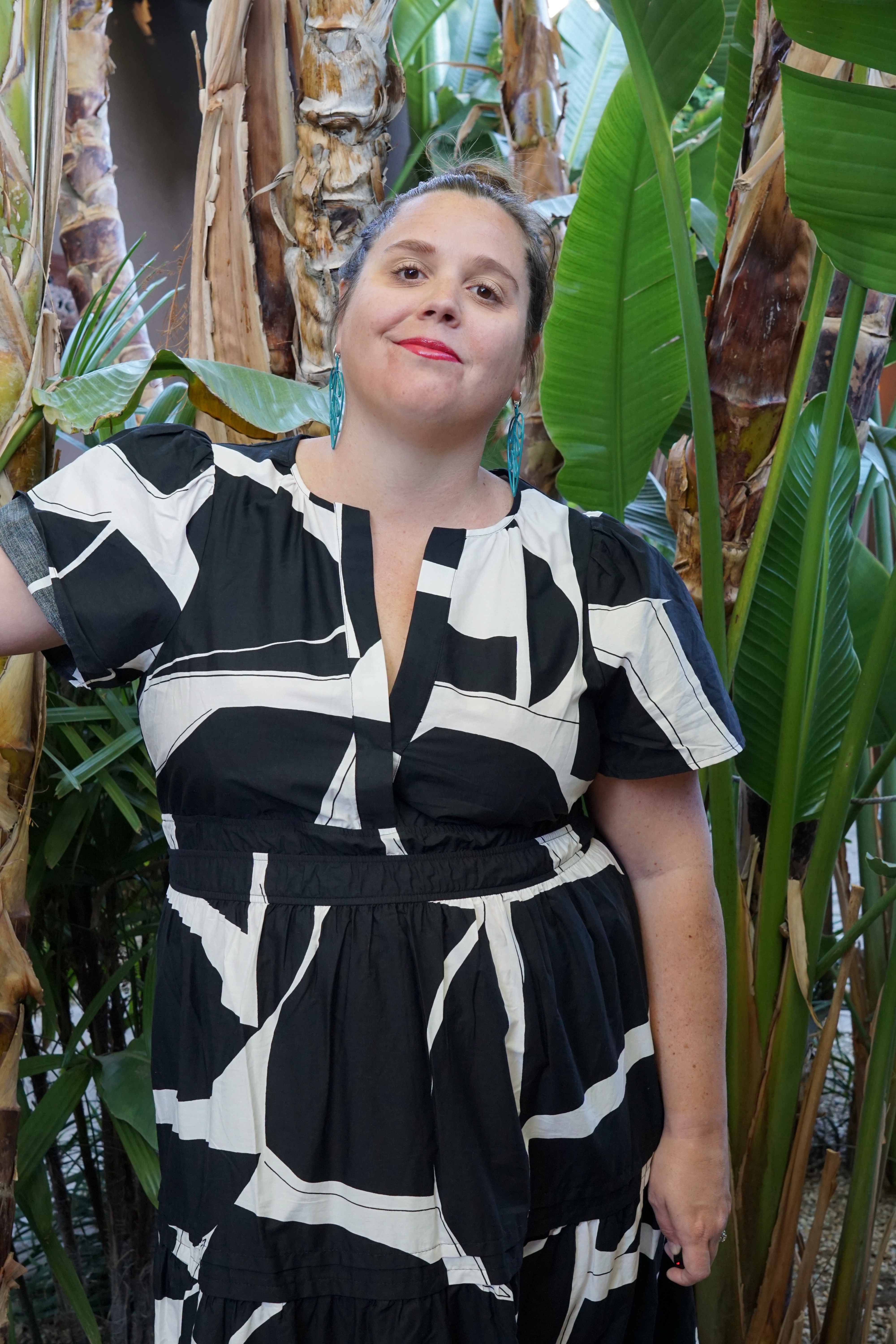 black and white dress and statement earrings in Palm Springs