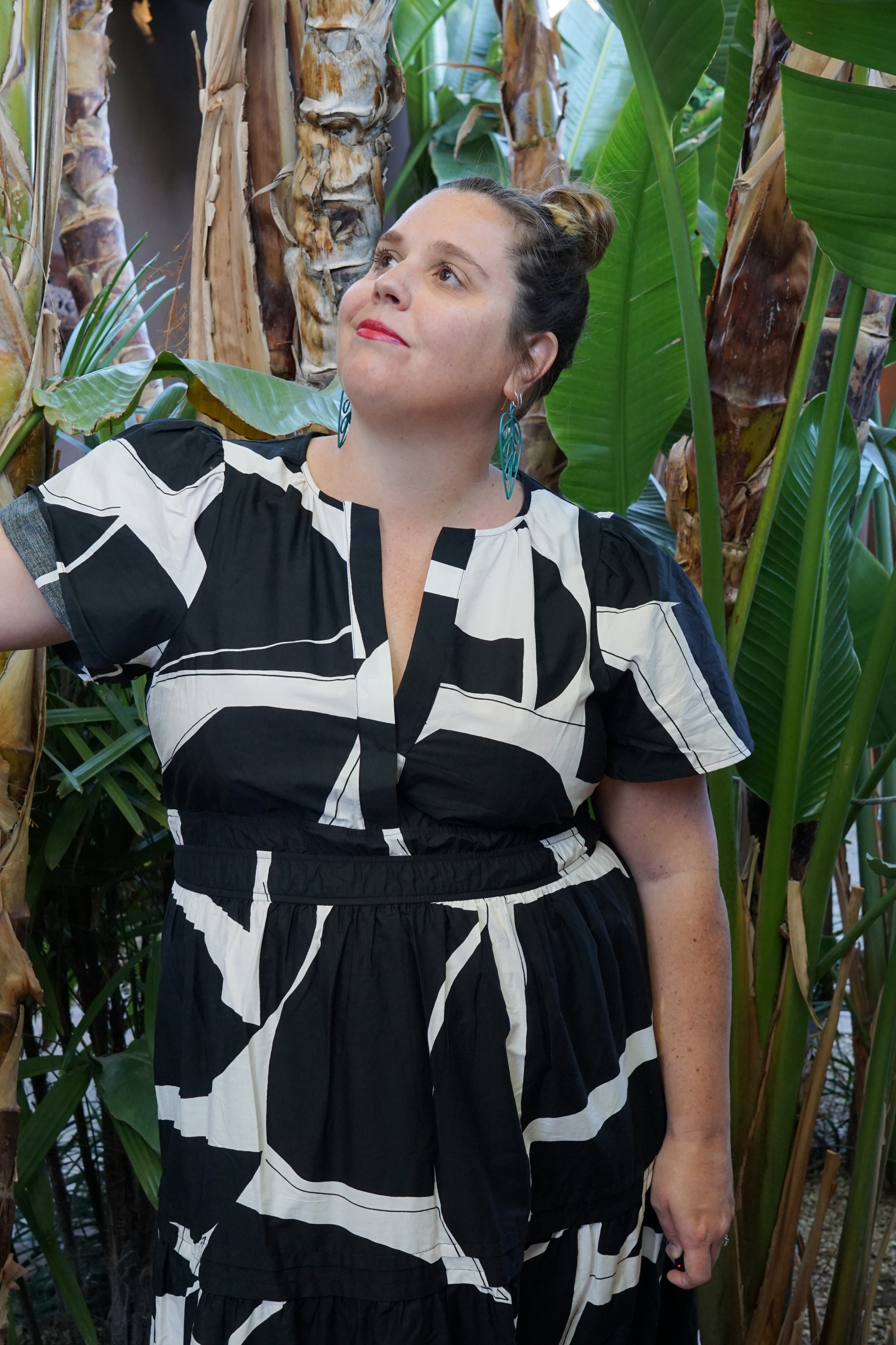 black and white dress and statement earrings in Palm Springs