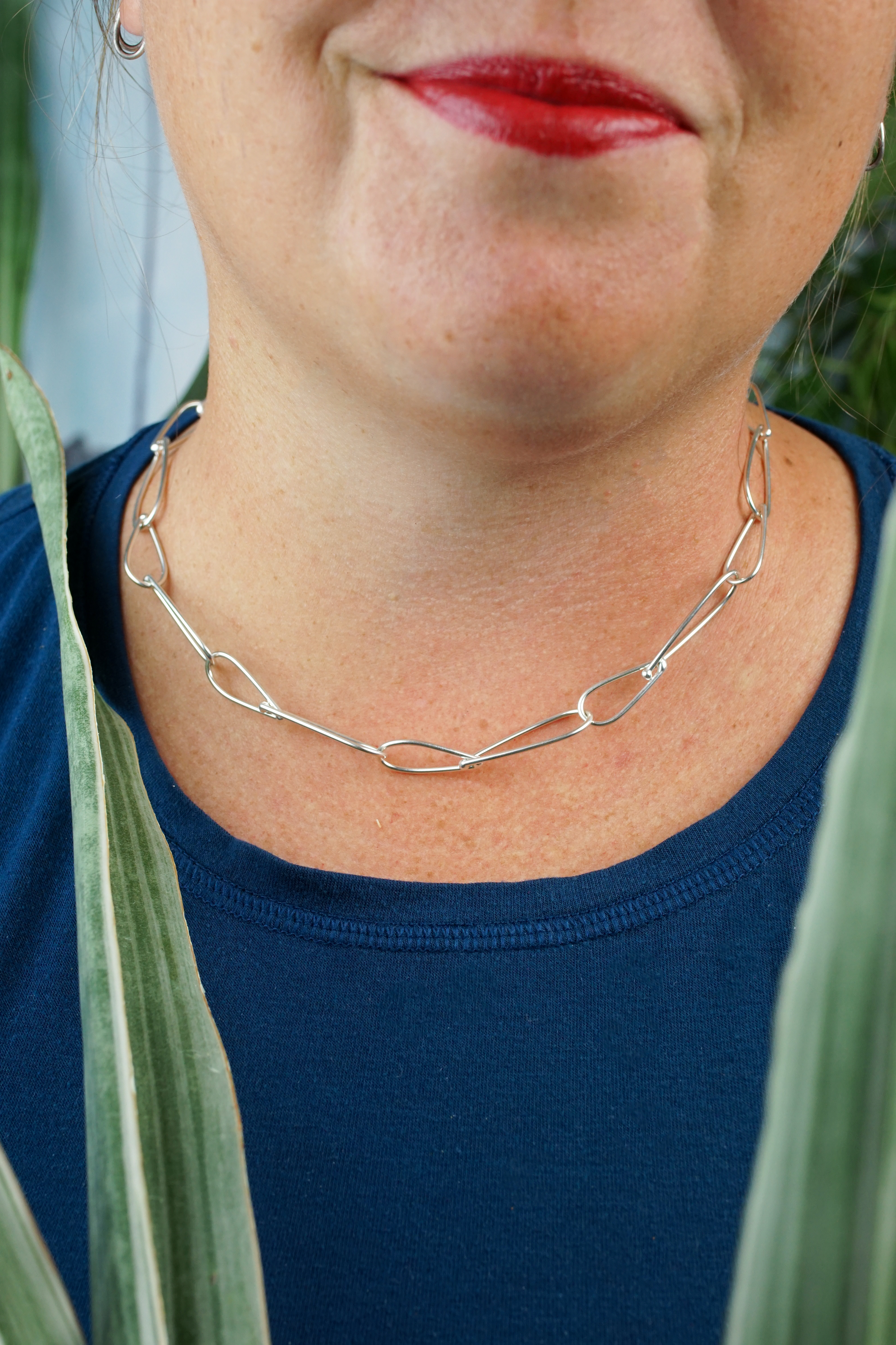 woman wearing 18" long silver chain link necklace