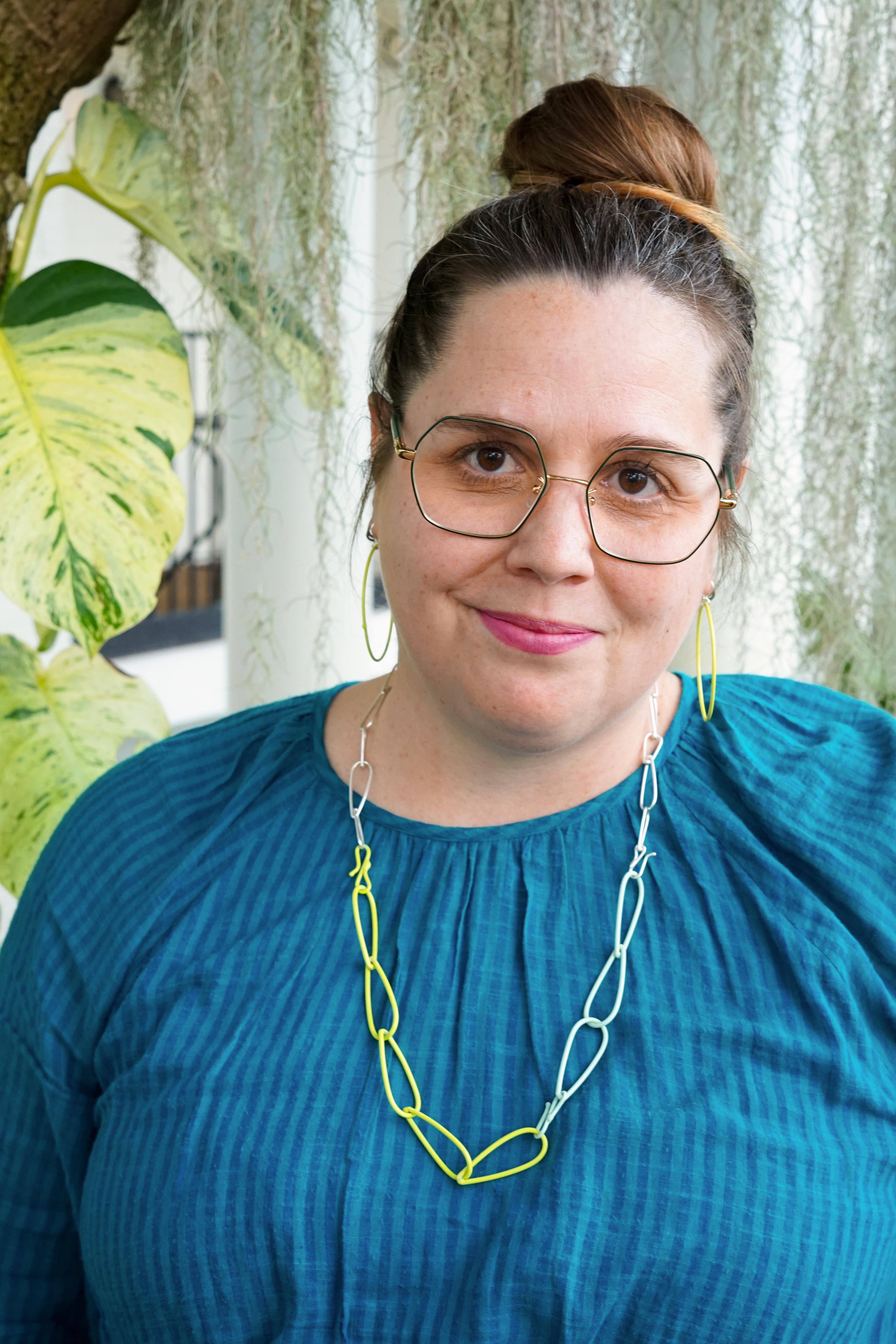 neon and mint green jewelry matching a variegated pothos