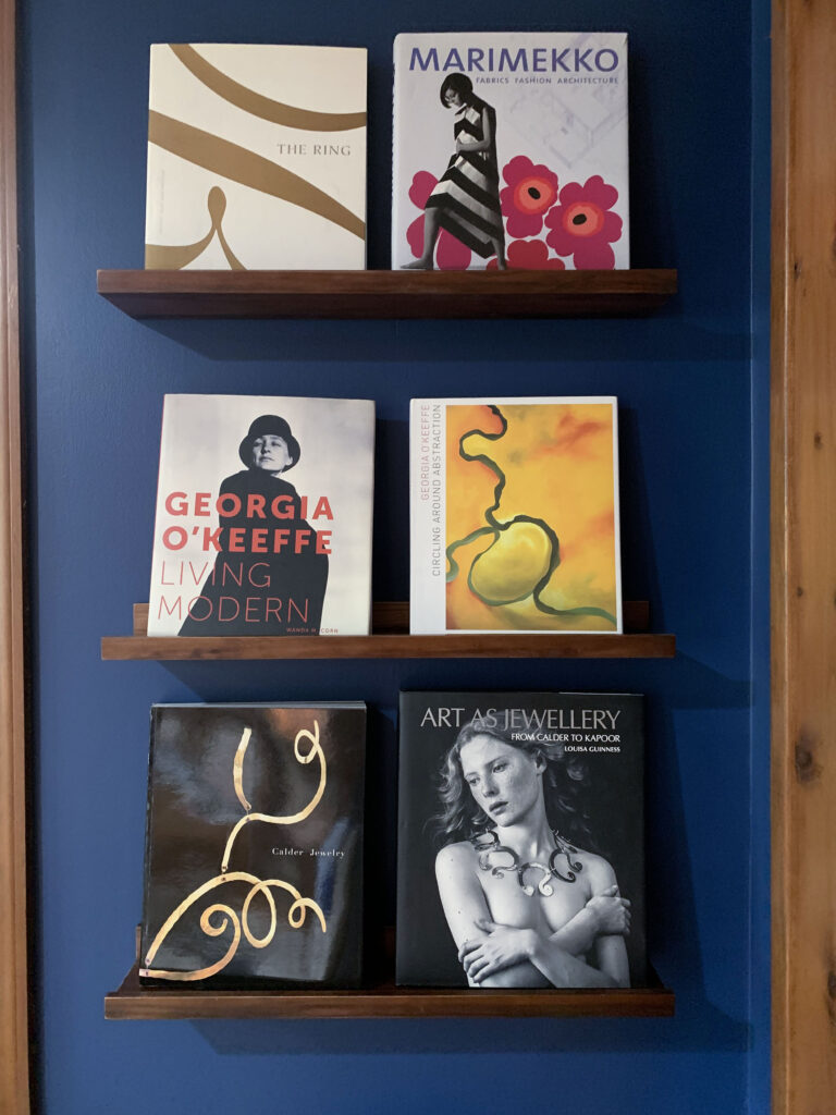 art library - books on calder jewelry, art jewelry, georgia o'keeffe, and marimekko