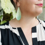 Megan in the garden with statement earrings, part 6