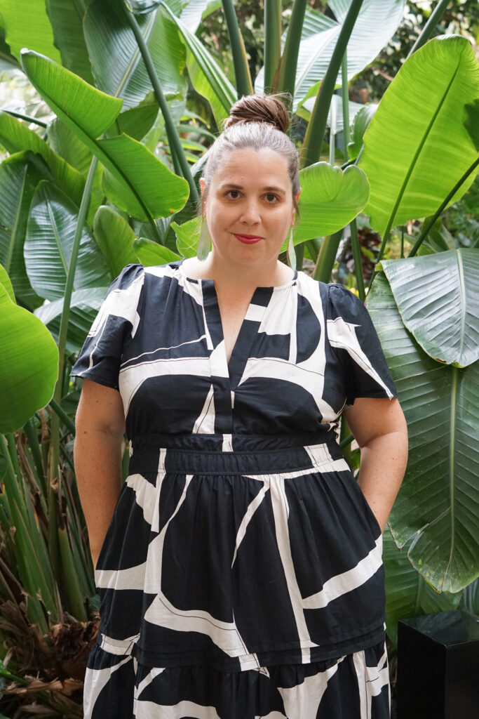 black and white dress and statement earrings in botanical garden