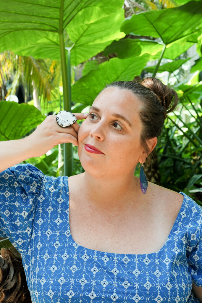 botanical garden portrait with statement ring and earrings