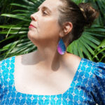 Megan in the garden with statement earrings, part 8