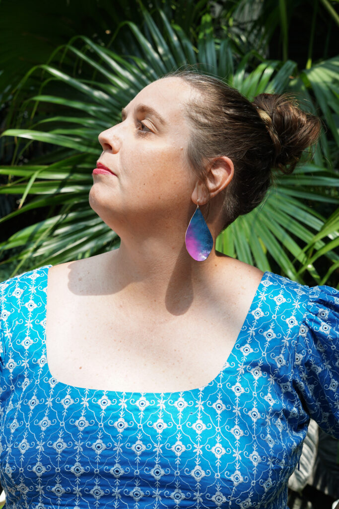 botanical garden fashion portraits with colorful statement earrings