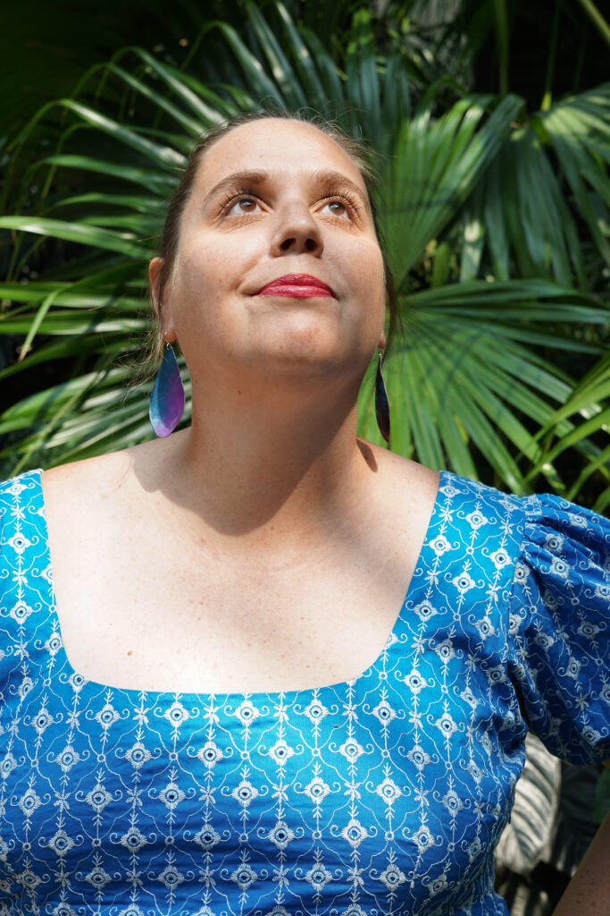 botanical garden fashion portraits with colorful statement earrings