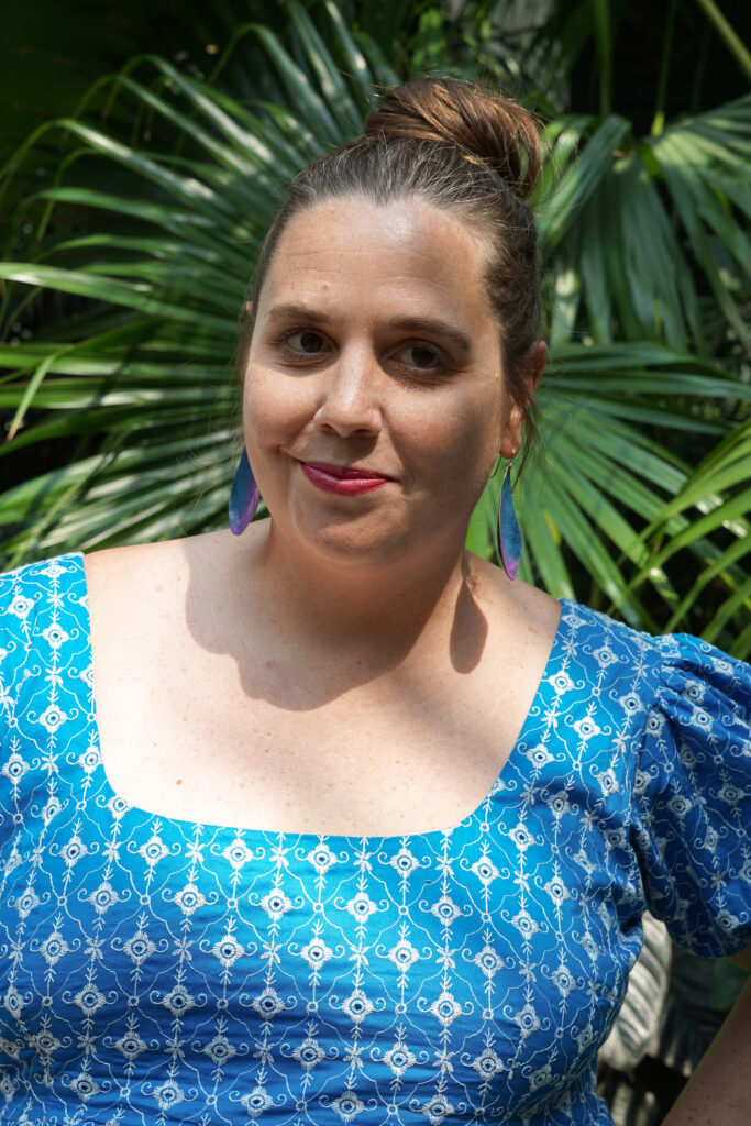 botanical garden fashion portraits with colorful statement earrings