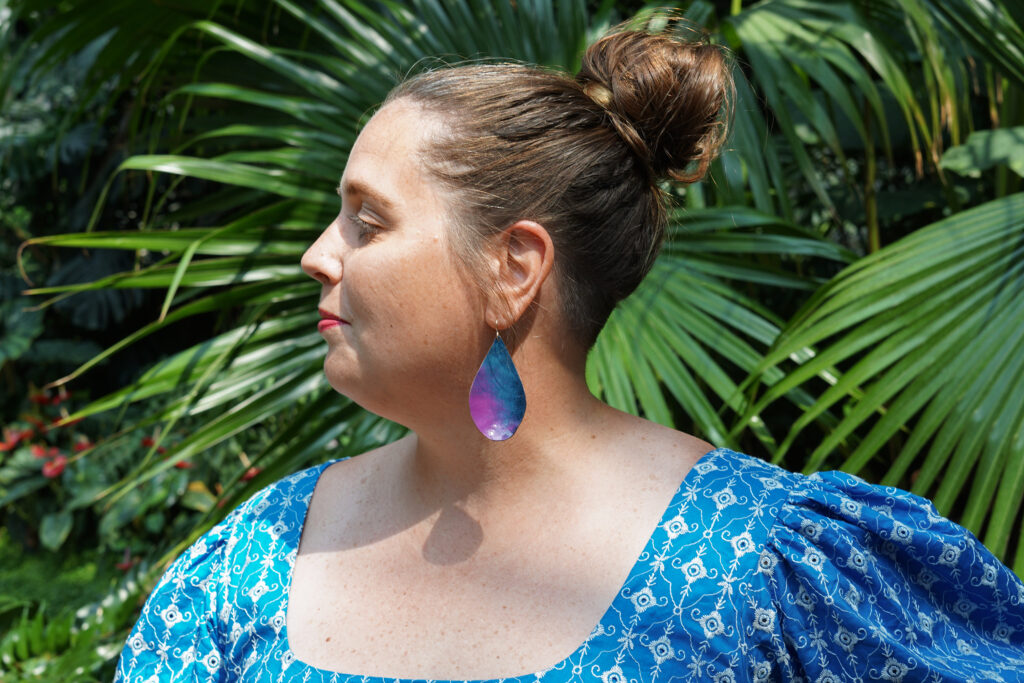 botanical garden fashion portraits with colorful statement earrings