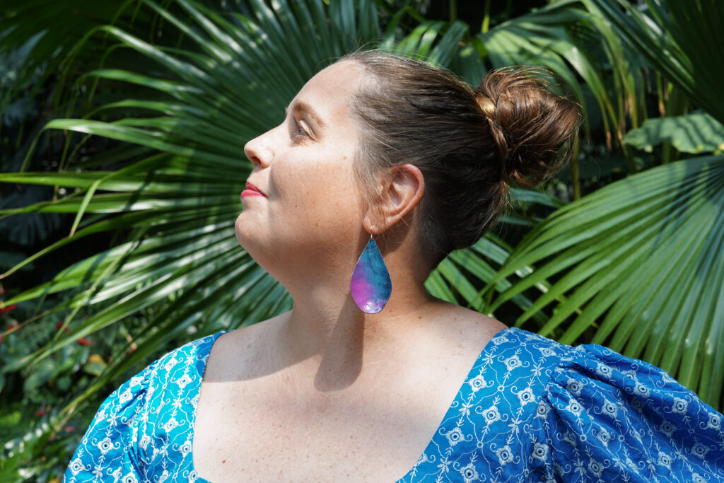 botanical garden fashion portraits with colorful statement earrings